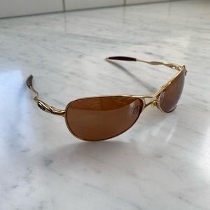 Gold Oakley Crosshair S sunglasses with brown lens